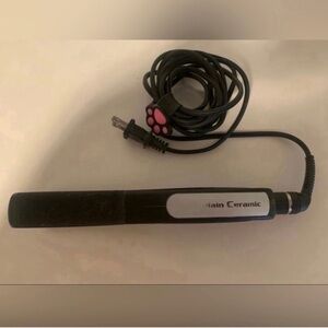 Conair Ceramic Flat Iron Hair Straightener. Works great.